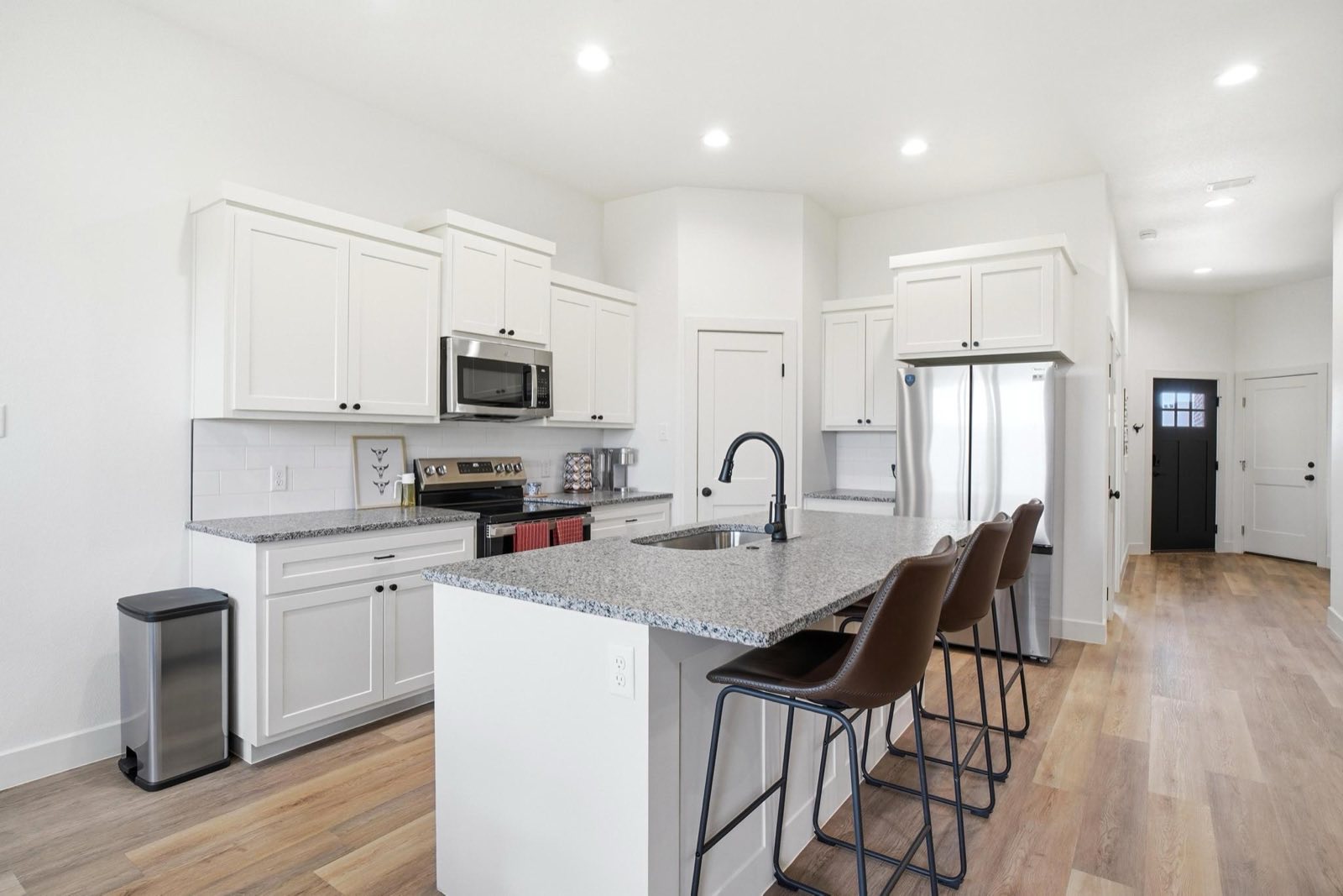 Kitchen island with bar seating in Wylie East 1